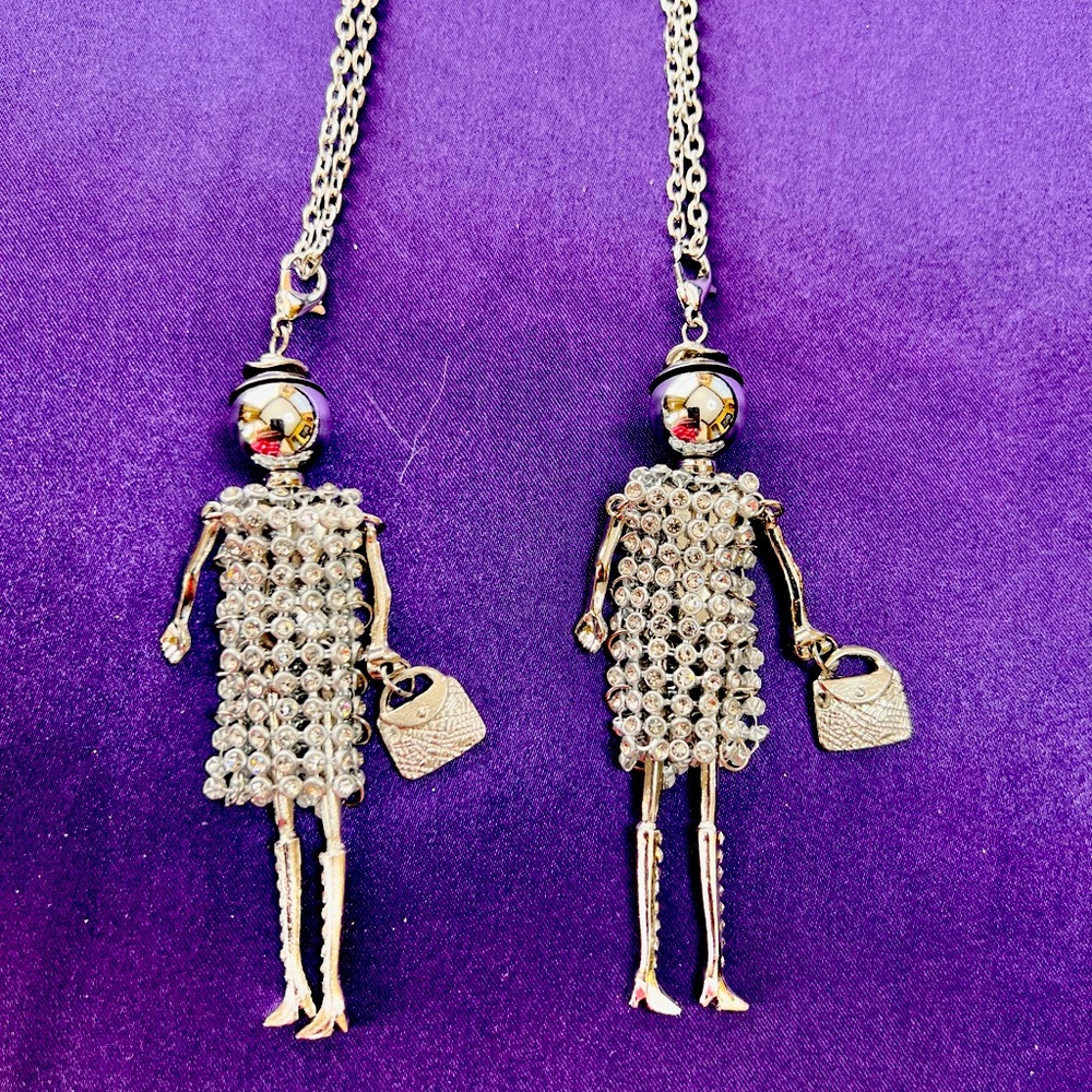 3 & 1/2” metal & rhinestone dolls with 28”necklaces